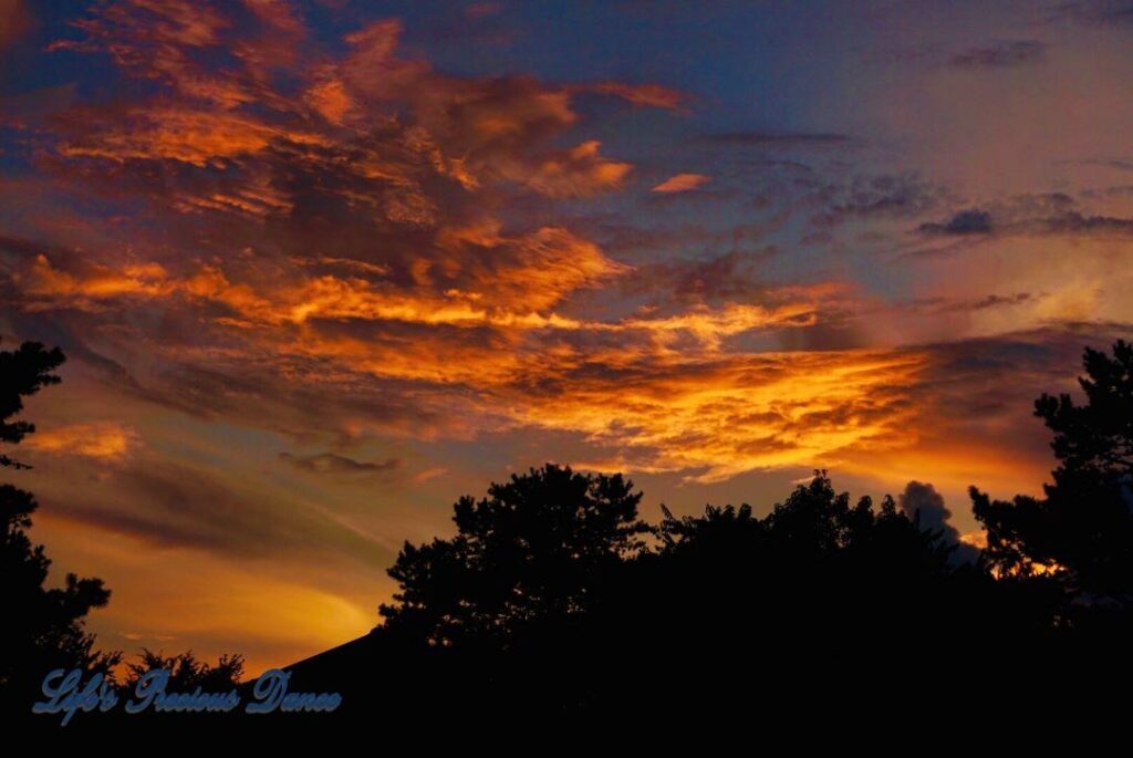 Colorful sunset with wispy clouds.