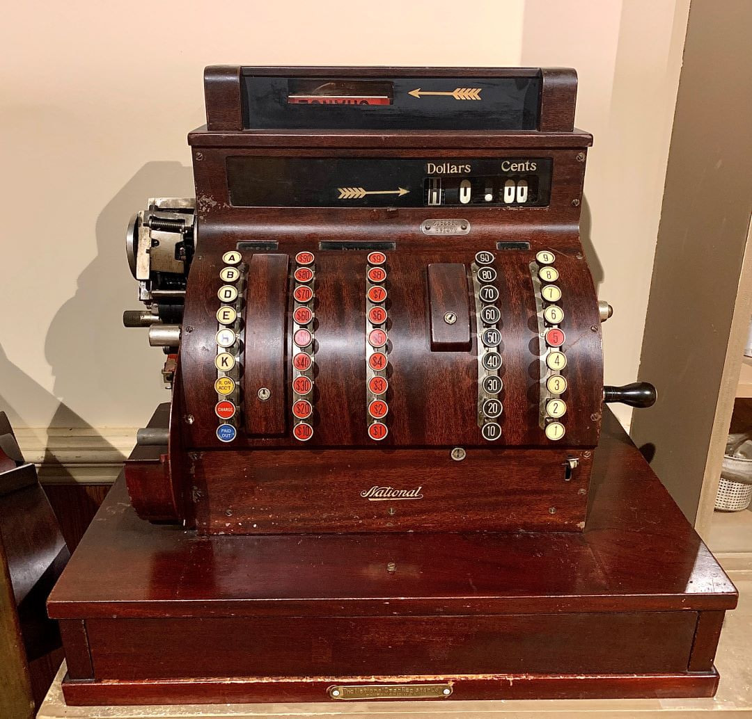 Antique register on a counter