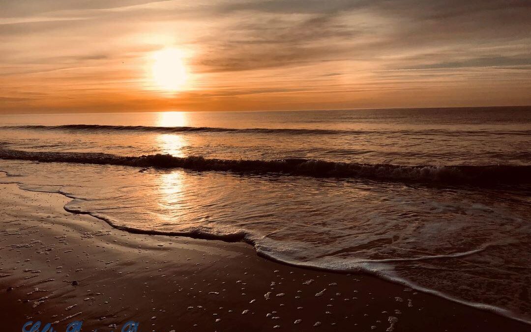 Sunrise at Myrtle Beach. High tide coming in.