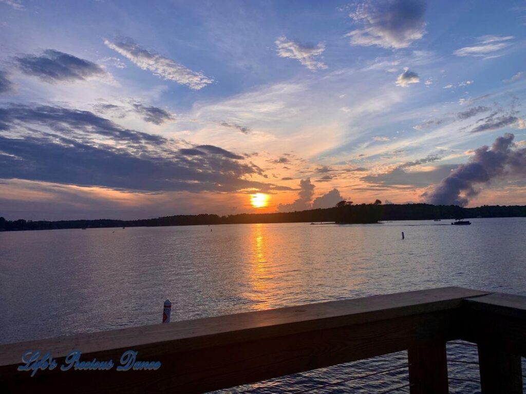 Sunset over a lake, taken from pier.