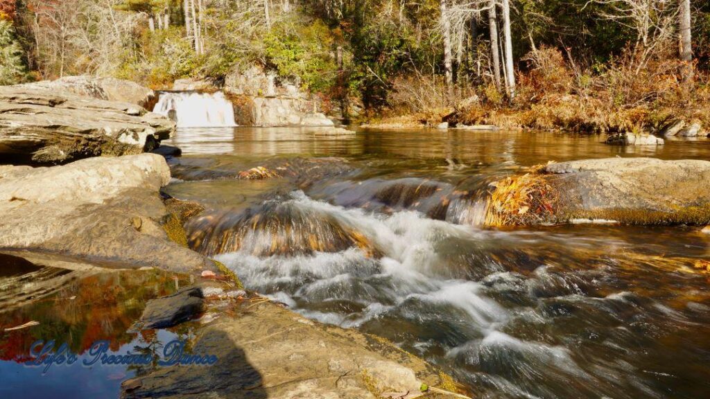 Water cascading through the rocks at the upper section of Linville Falls