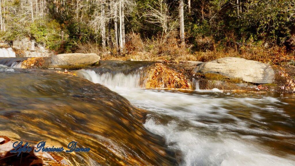 Water cascading through the rocks at the upper section of Linville Falls