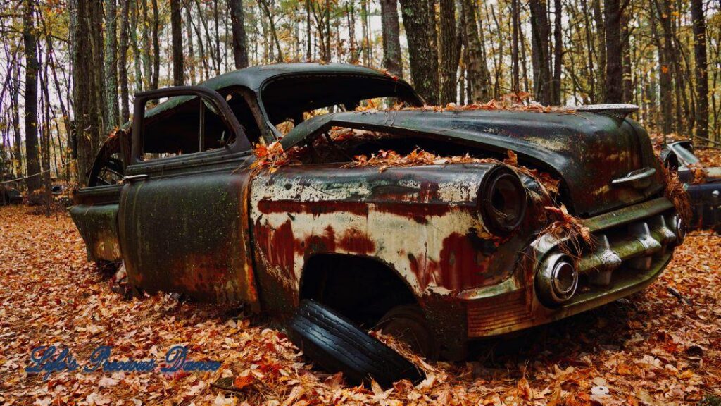 Vintage junk Desoto rusting away in the woods