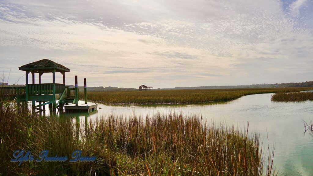 Landscape of the marsh at Pawley&#039;s Island. Several piers in the background