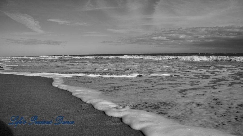 Black and white of waves rolling in at Pawley&#039;s Island