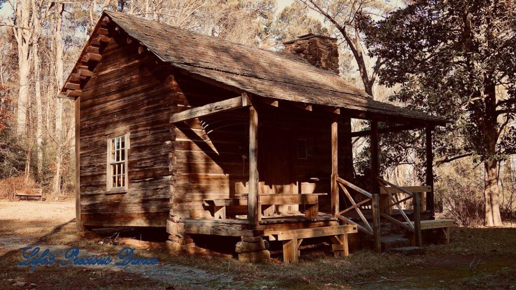 Historic McLendon Cabin partially shaded.