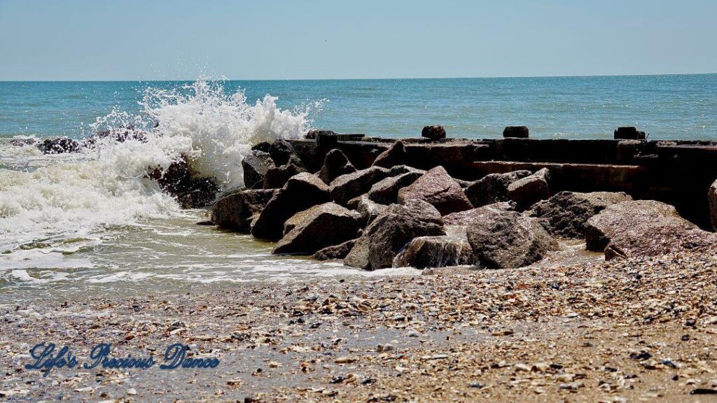 Waves crashing on a rock barrier at Edisto Beach.