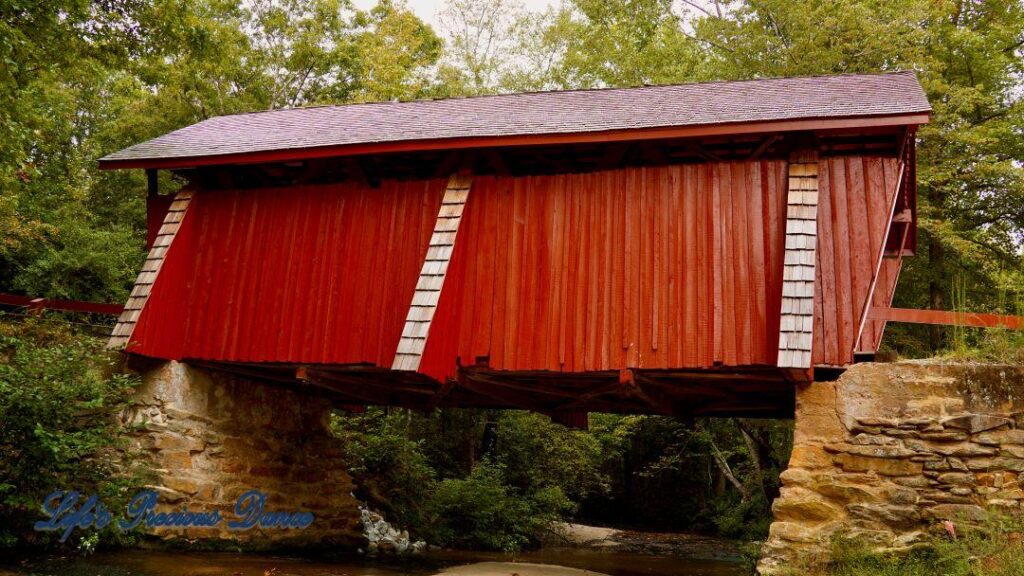 Up close of Campbell&#039;s Covered Bridge spanning the creek.