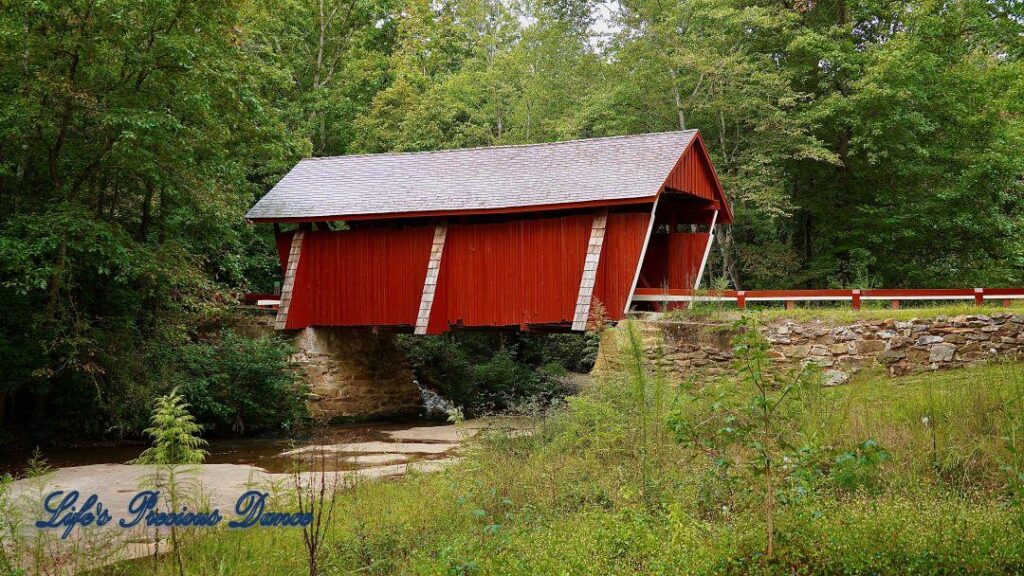 Side View of Campbell&#039;s Covered Bridge spanning the creek.