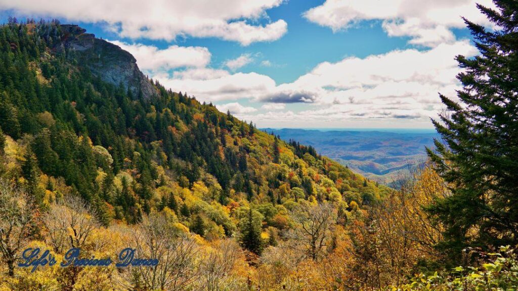 Landscape view of the colorful Blueridge mountains from Devil&#039;s Courthouse. Fluffy clouds overhead.