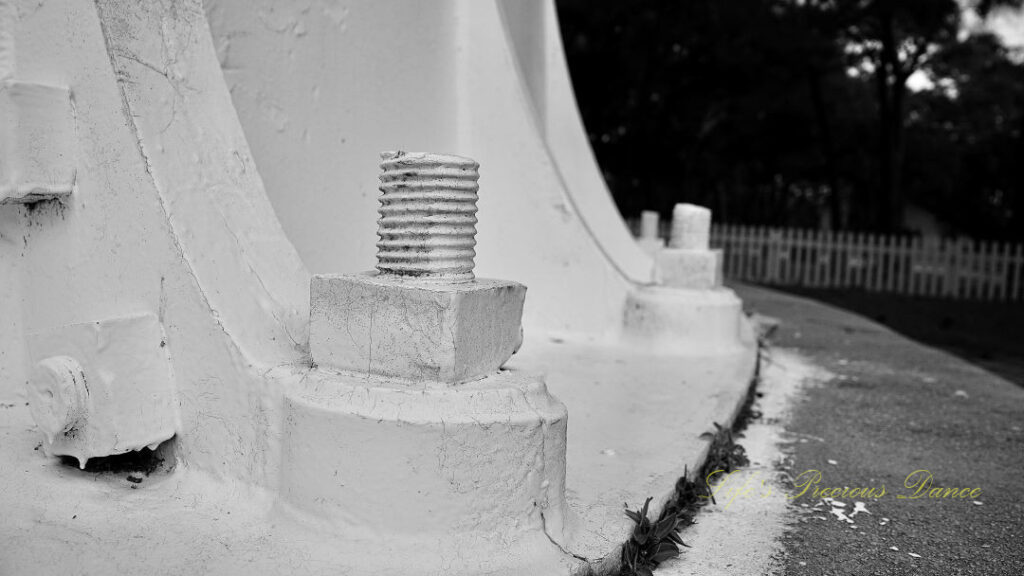 Black and white of screw at the base of the Hunting Island lighthouse.