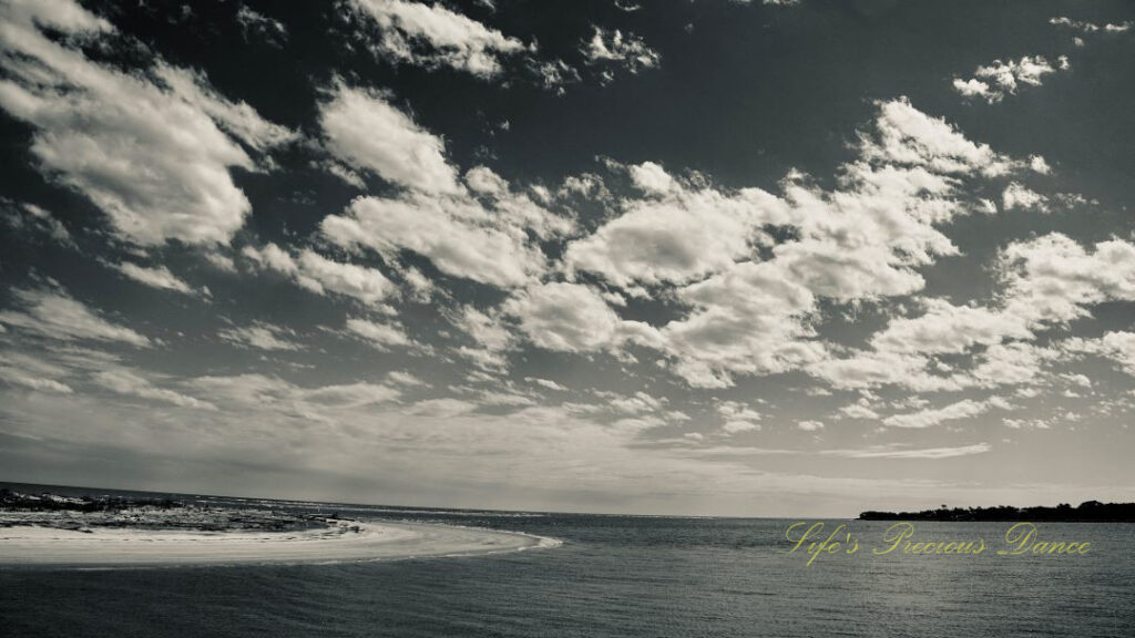 Black and white of clouds over the atlantic ocean.