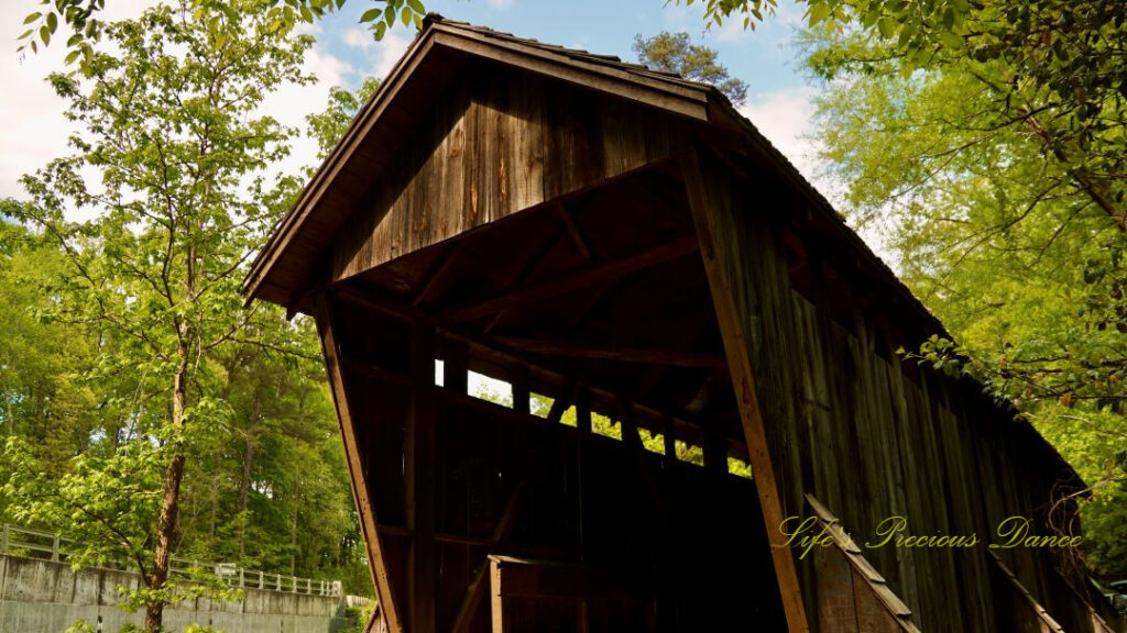 Looking upward at the entrance of historic Pisgah Covered Bridge.