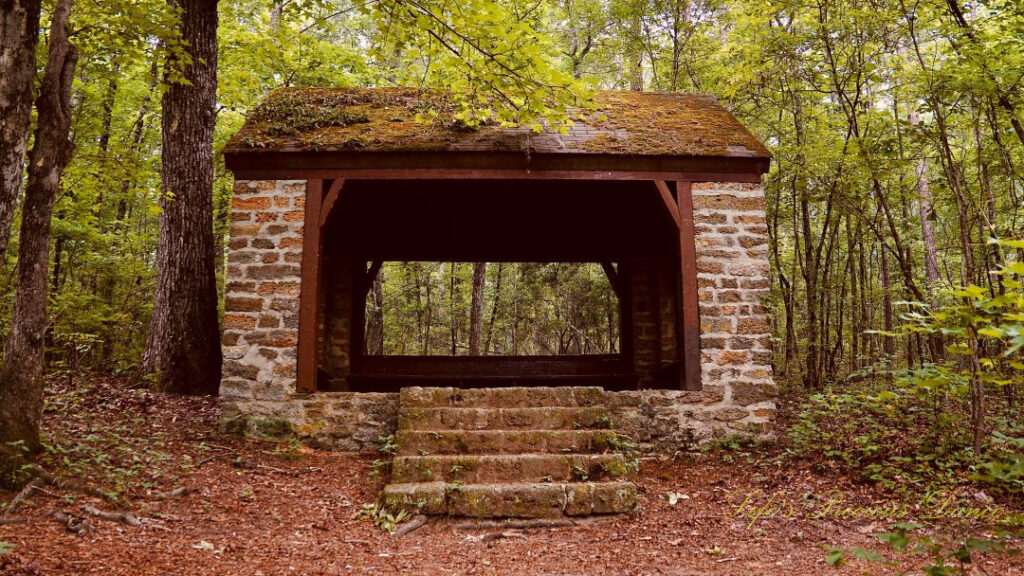 Front view of a brick shelter along a trail at Poinsett State Park.