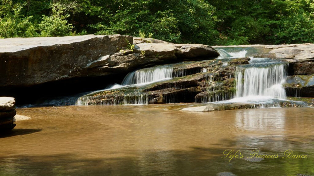 Horseshoe Falls spilling over rocks into the Enoree River.