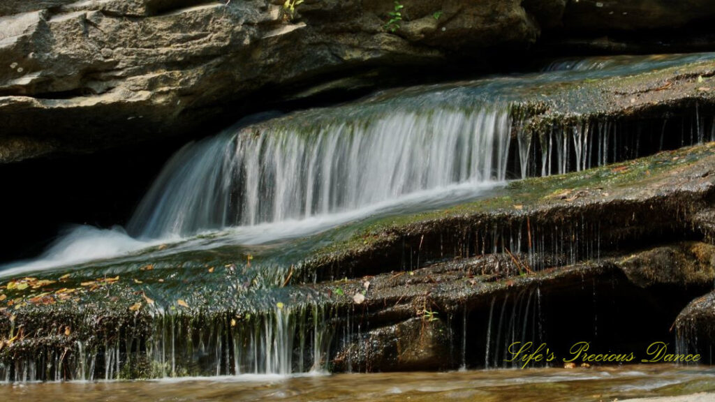 Close up of Horseshoe Falls spilling over rocks into the Enoree River.