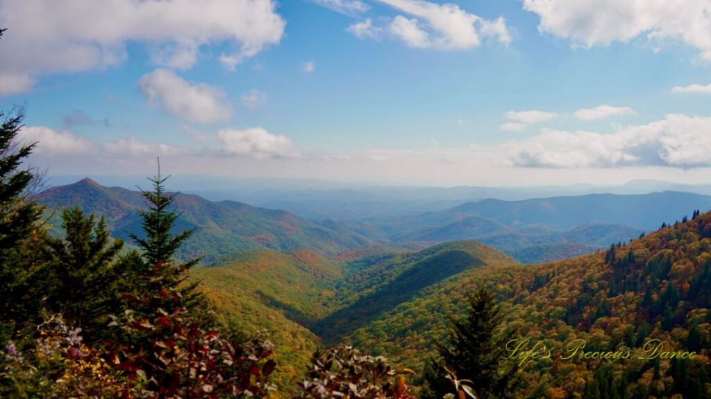 Landscape view of the colorful blue ridge mountains. Passing clouds overhead.