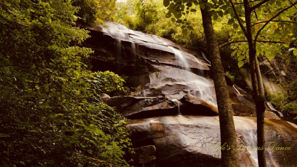 Upper section of Daniel Ridge Falls spilling over the rock ledge and down the boulders