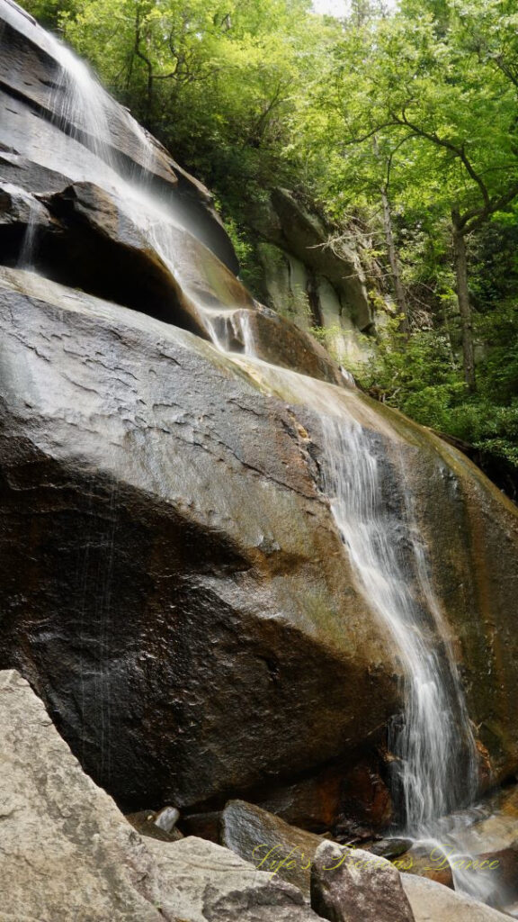 Daniel ridge falls cascading down over boulders.