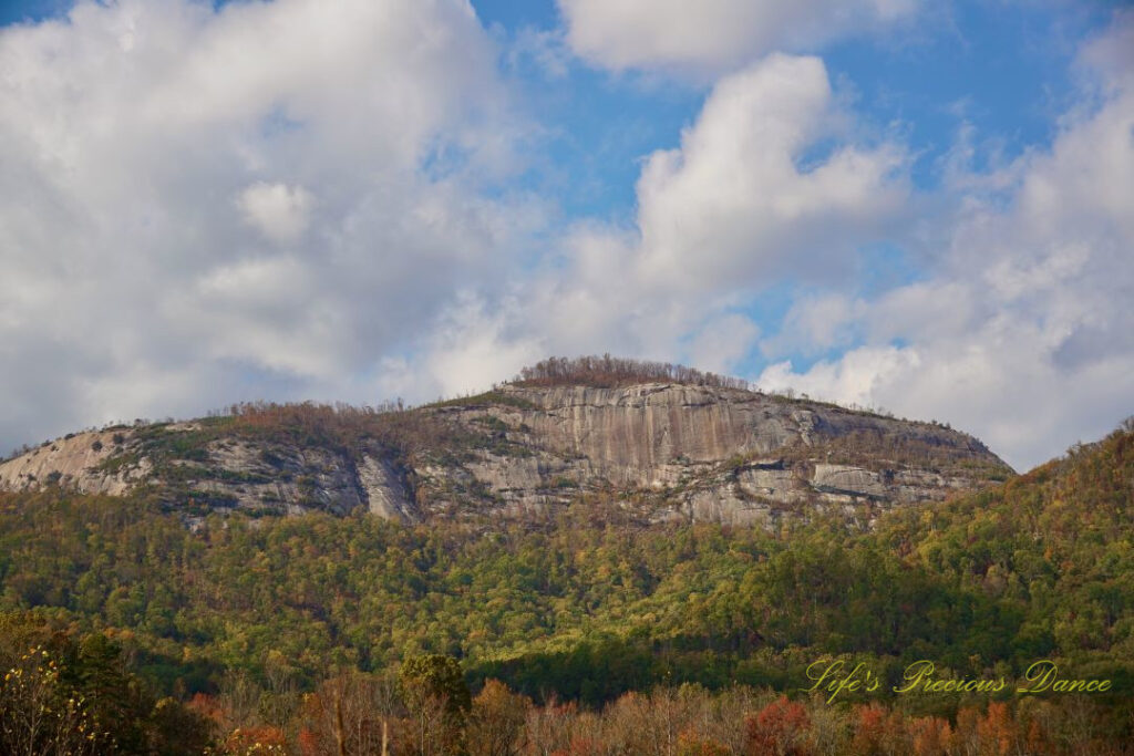 Zoomed in view of Table Rock. Passing clouds overhead.