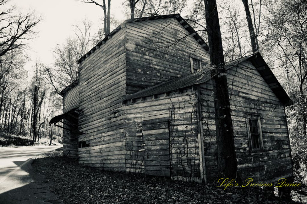 Black and white front and side view of historic Gilreath&#039;s MIll.