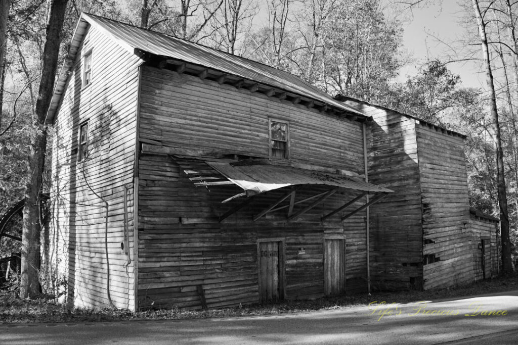 Black and white front and side view of historic Gilreath&#039;s MIll.