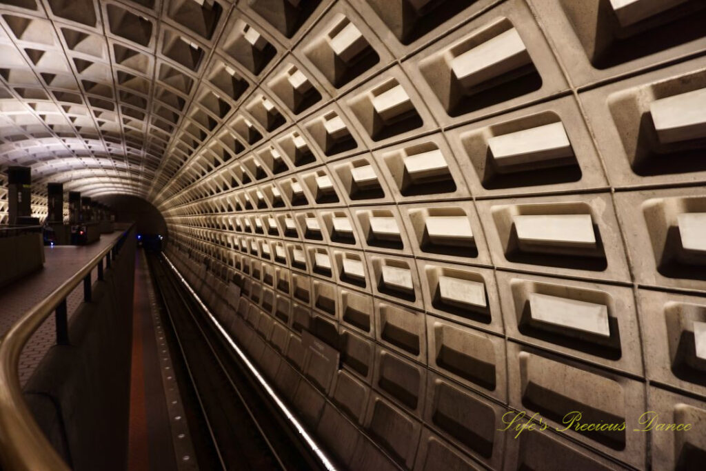 Looking down the track of the tunnel at DC Metro station.