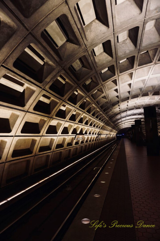 Looking down the track of the tunnel at DC Metro station.